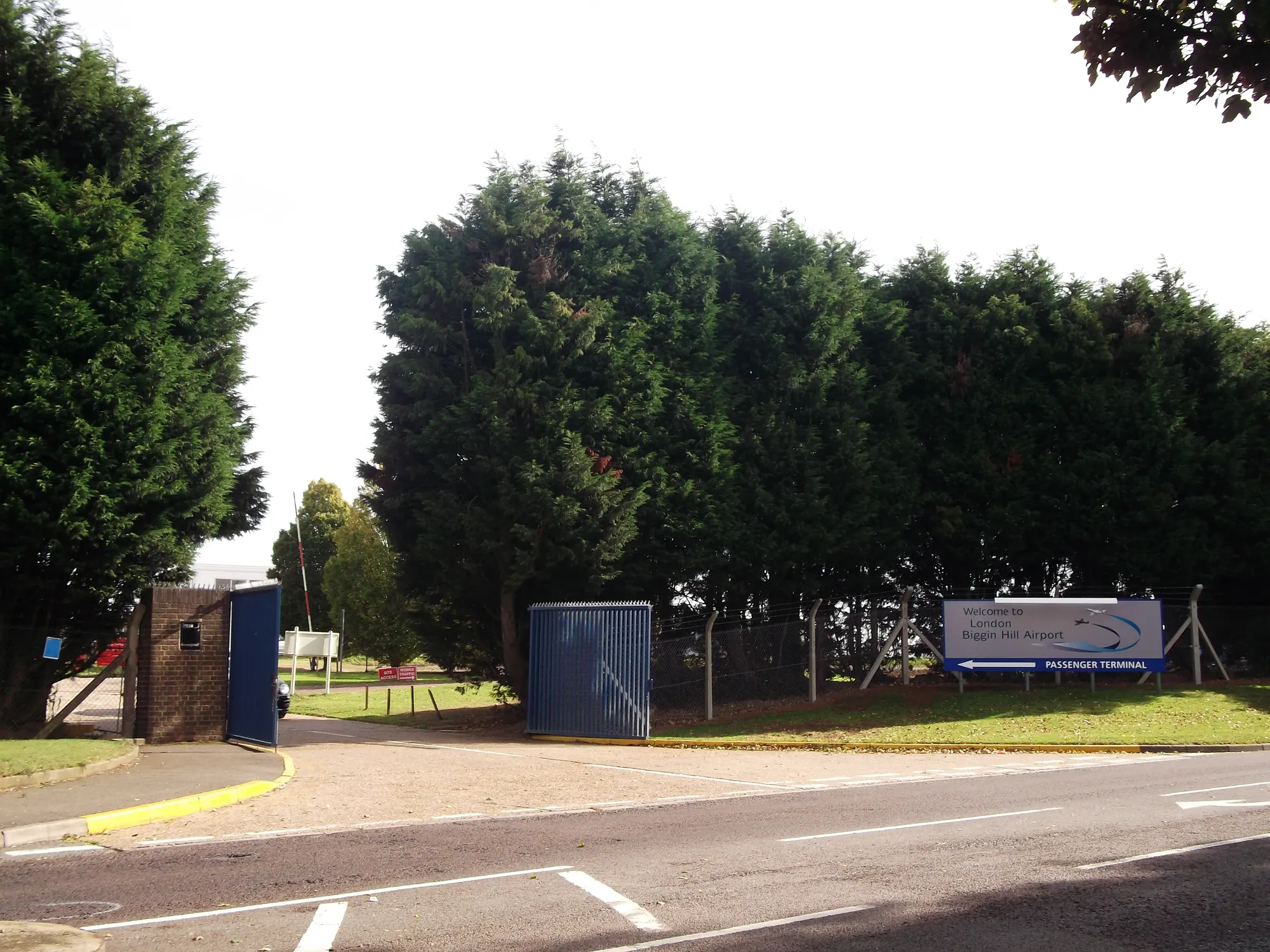 Historic London Biggin Hill Airport entrance sign and road photographed in October 2011