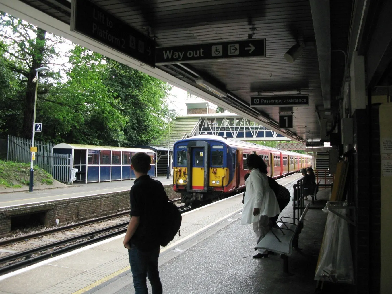 Passengers and a train at Bracknell station in May 2014