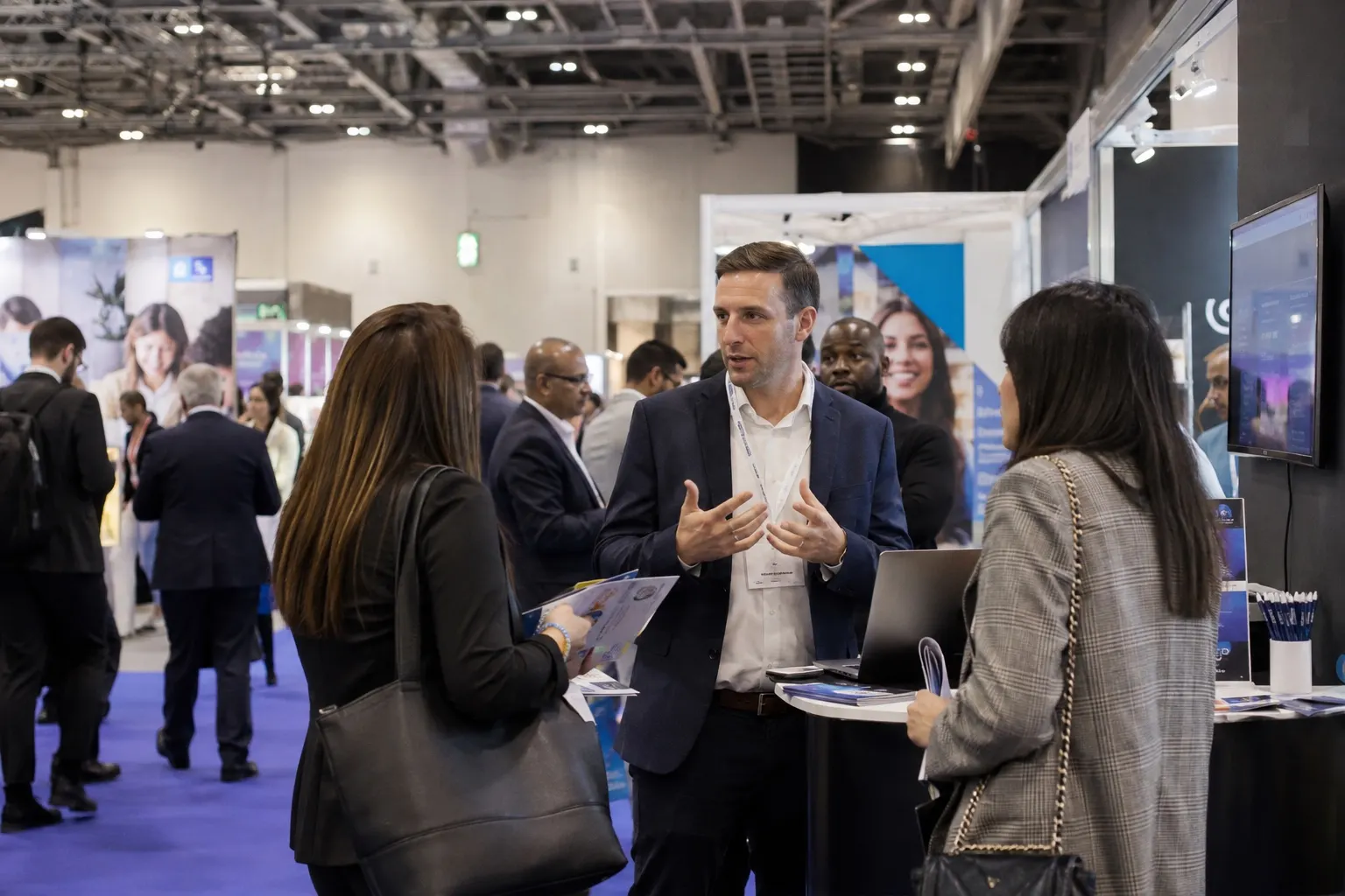 Illustrative Business Show-style exhibition hall with founders and professional services stands