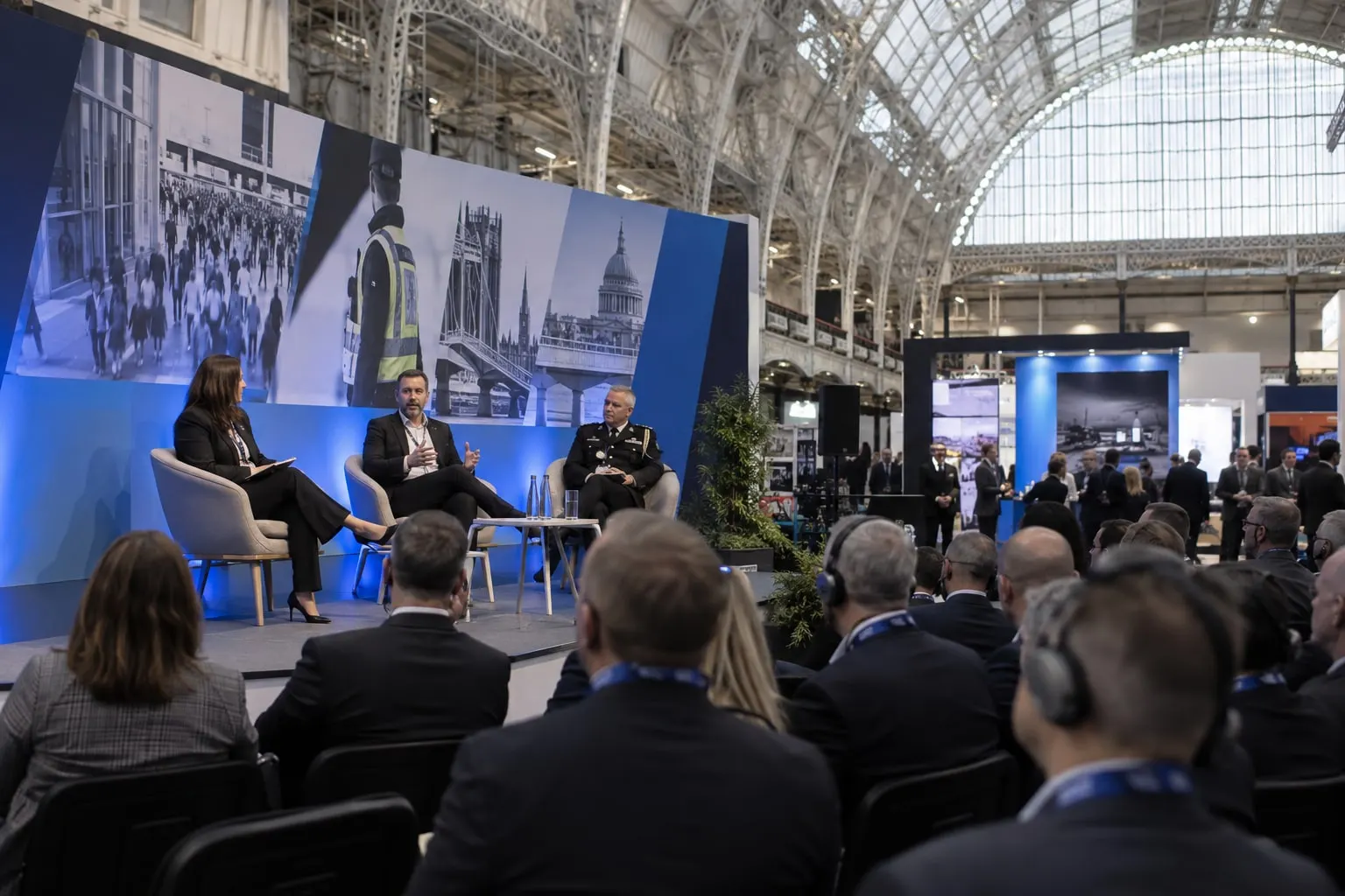 Illustrative security and resilience panel session inside Olympia's Grand Hall