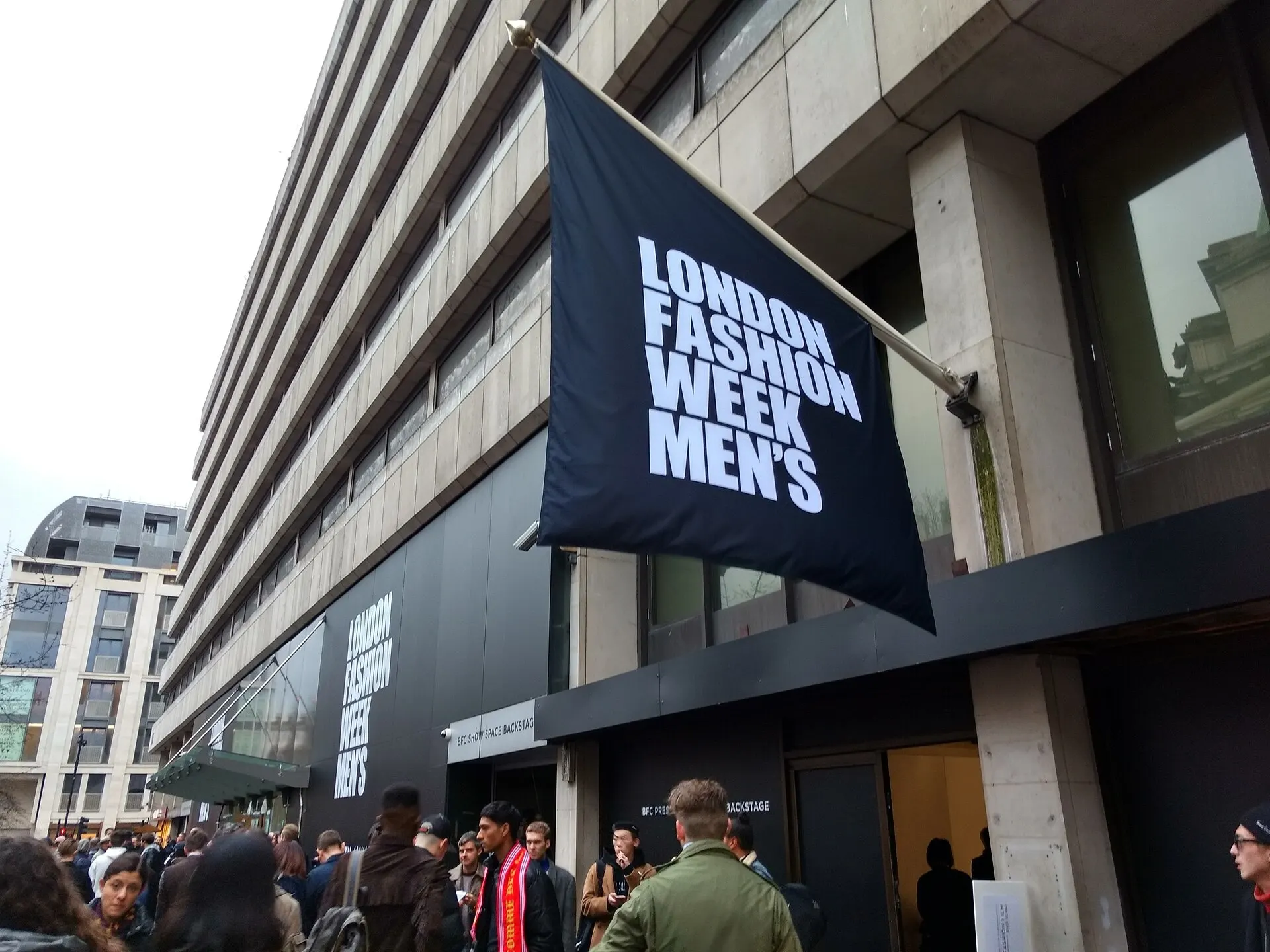 London Fashion Week Men's venue signage on the Strand in 2017