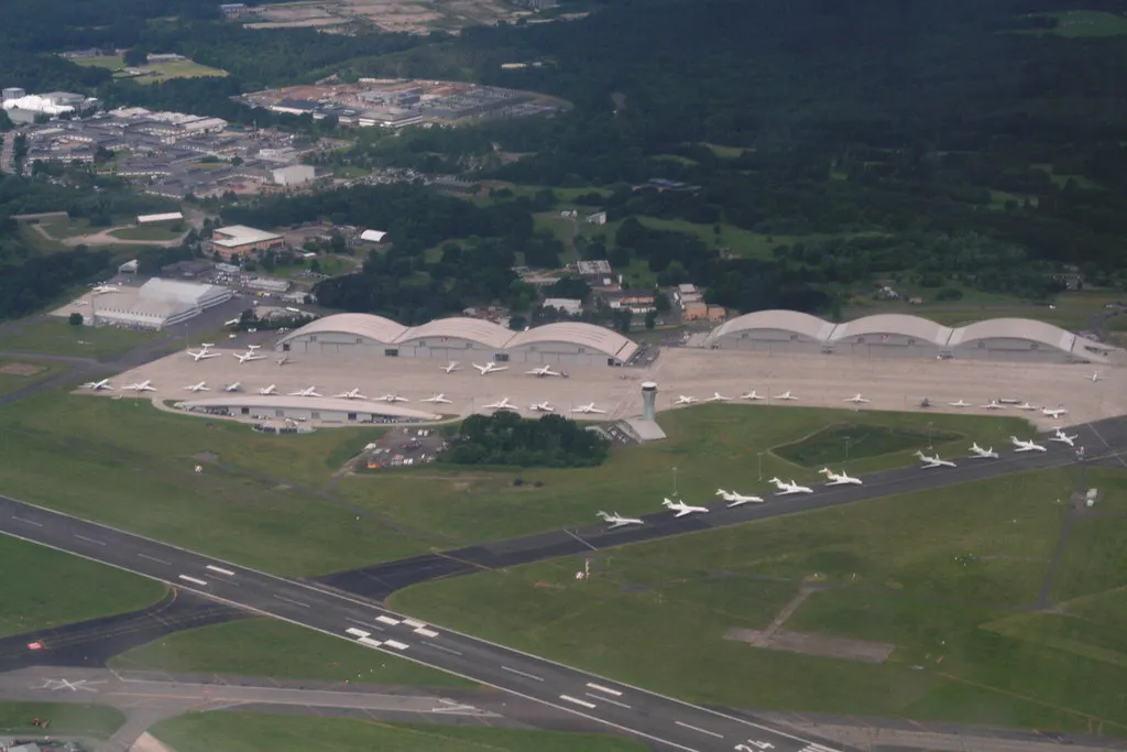 Farnborough Airport apron, hangars and business aircraft in June 2016