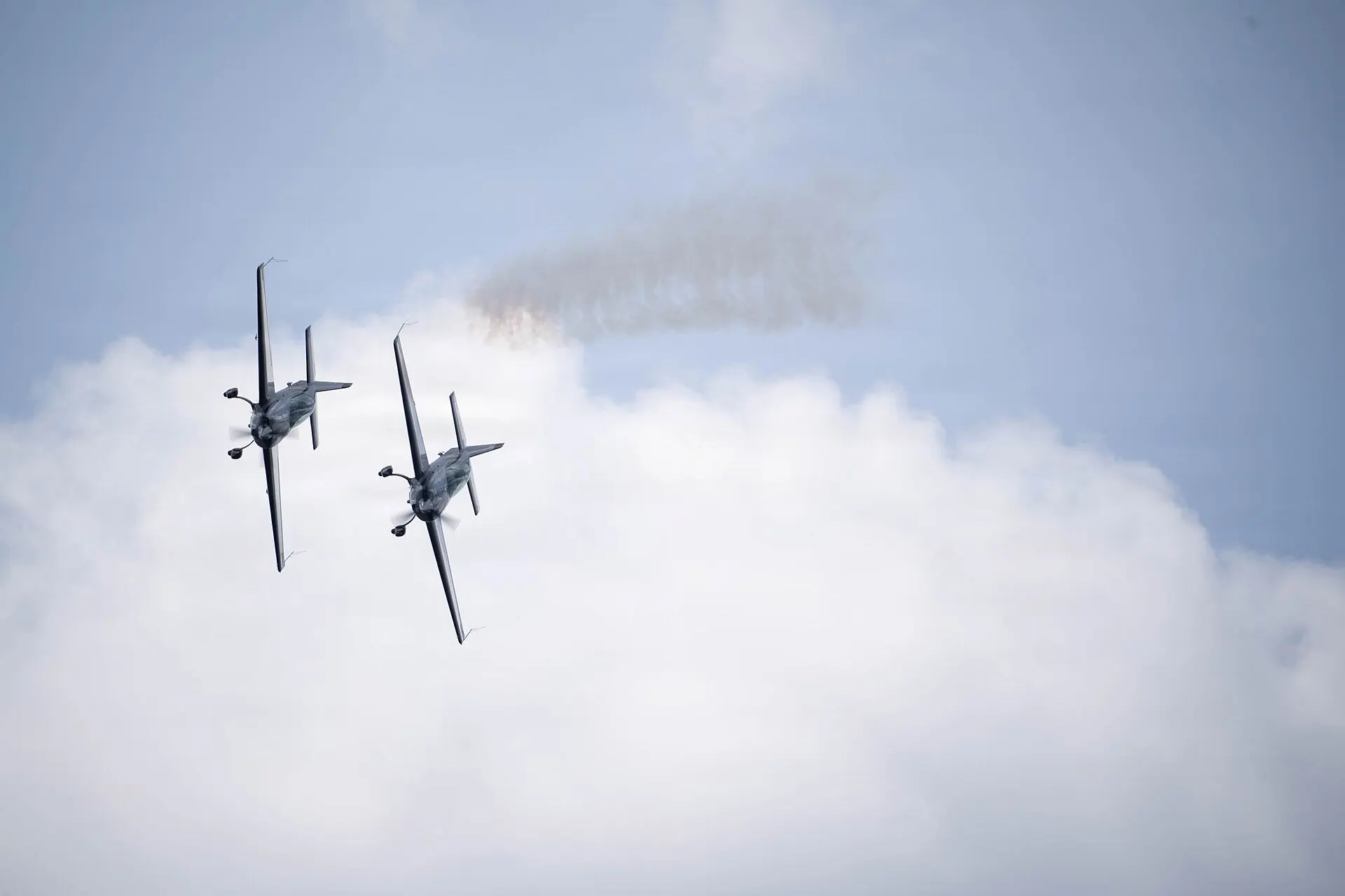 Military helicopters flying at Farnborough International Airshow
