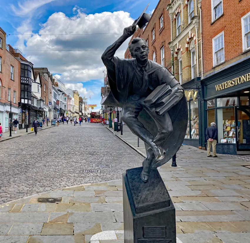 The Surrey Scholar statue on Guildford High Street in summer 2024