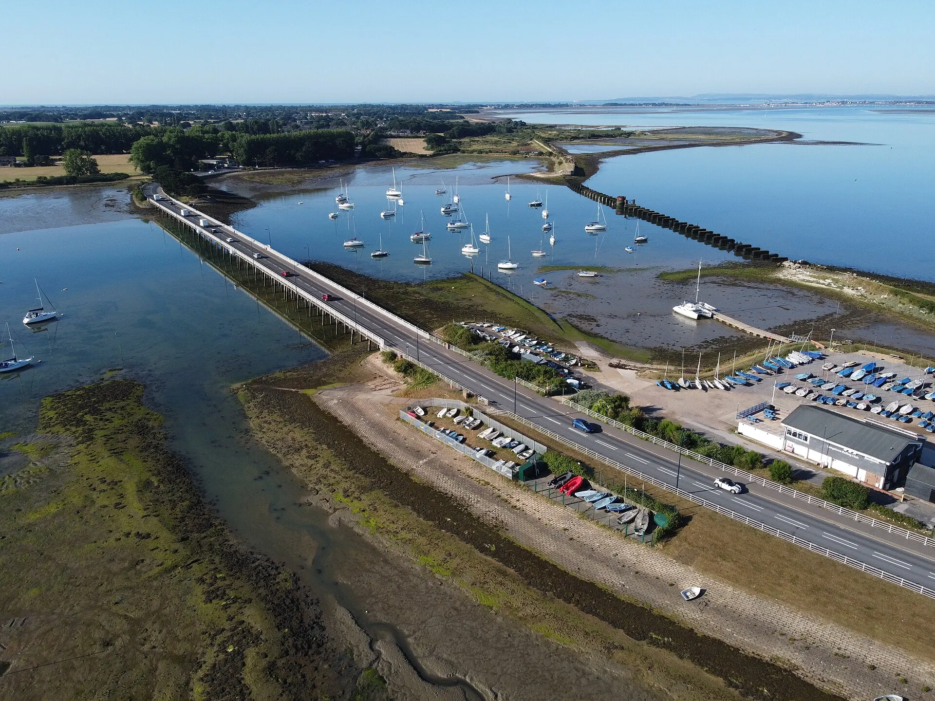 Road bridge and coastal waters leading onto Hayling Island in July 2025