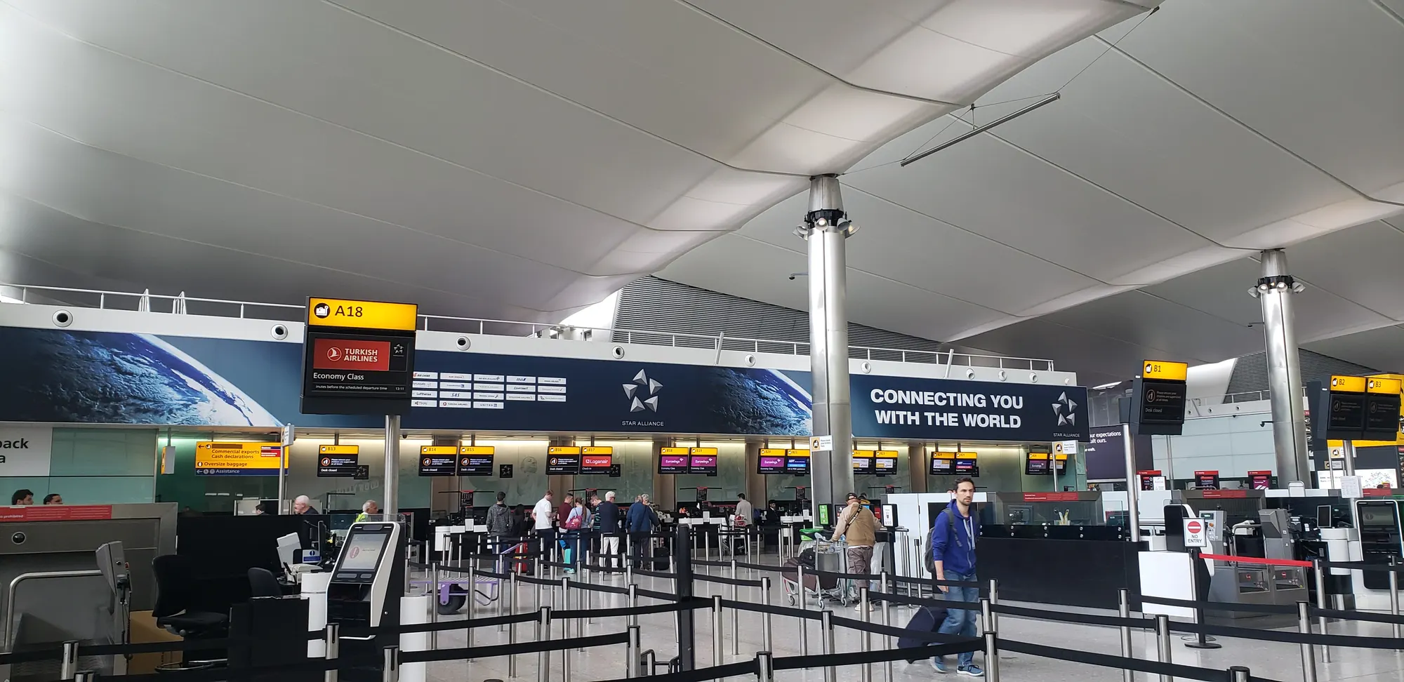 Photograph of the public check-in hall at Heathrow Terminal 2 in 2024