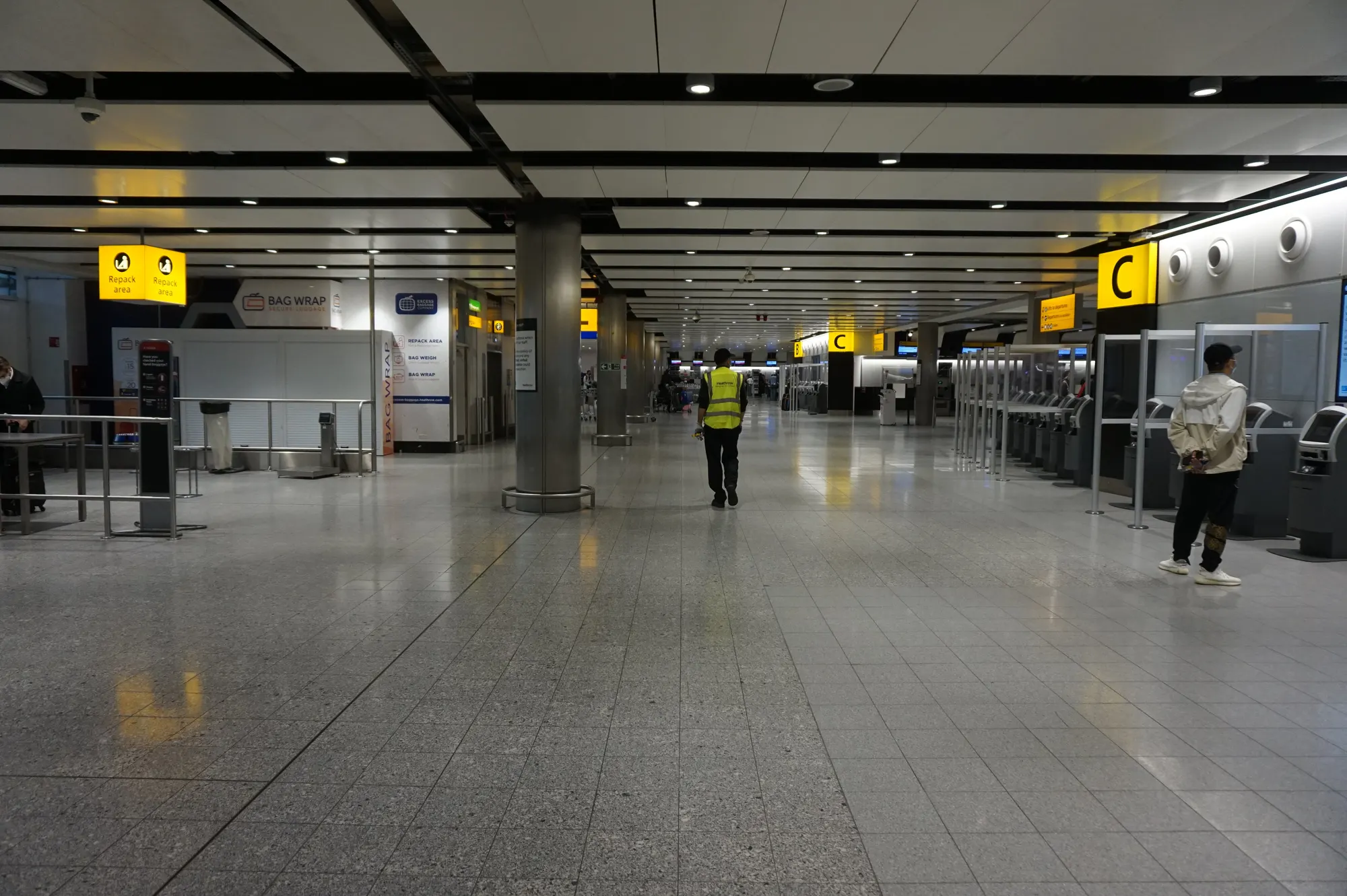 Heathrow Terminal 3 public check-in area photographed in September 2021; use current airline and zone signs