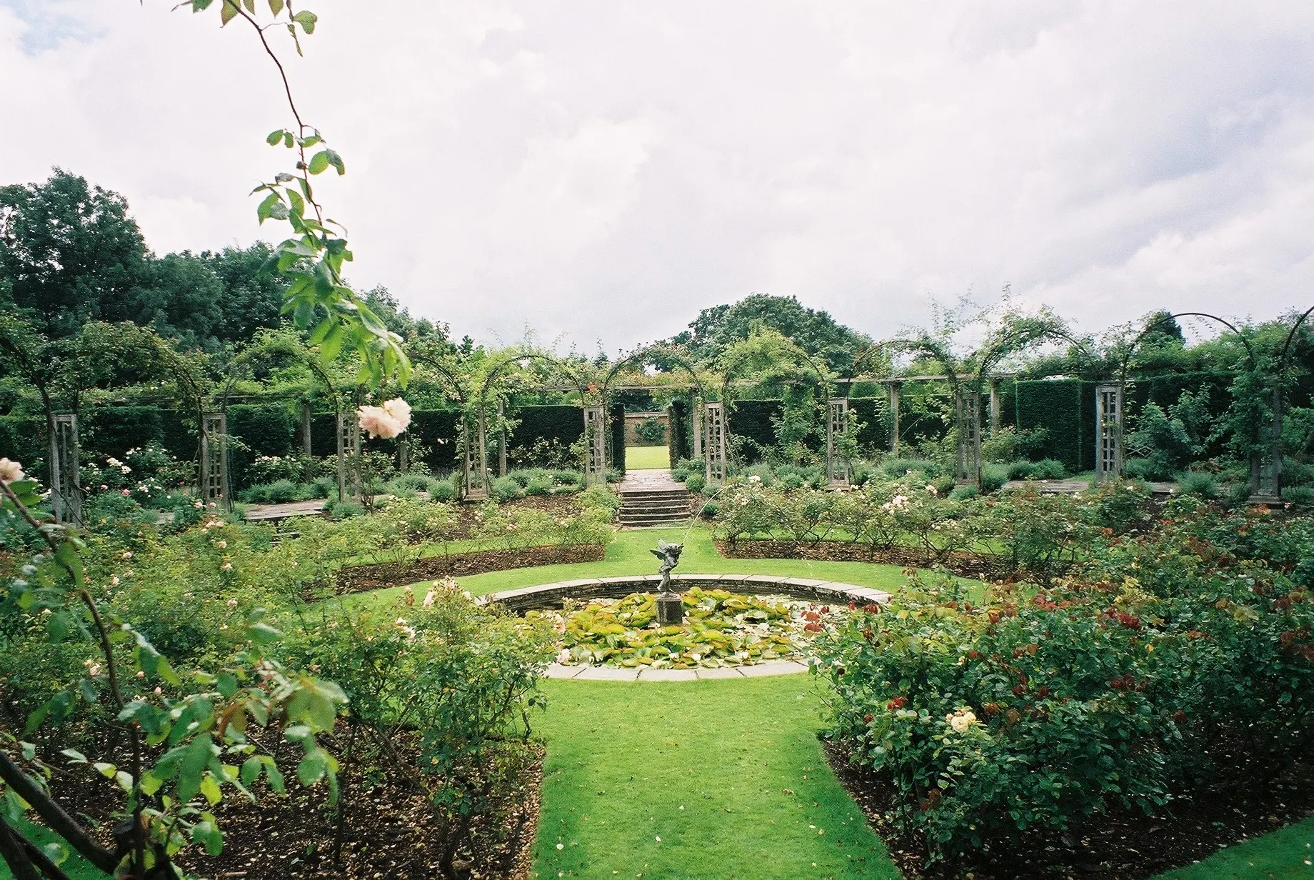 Formal gardens and fountain within the Great Fosters estate