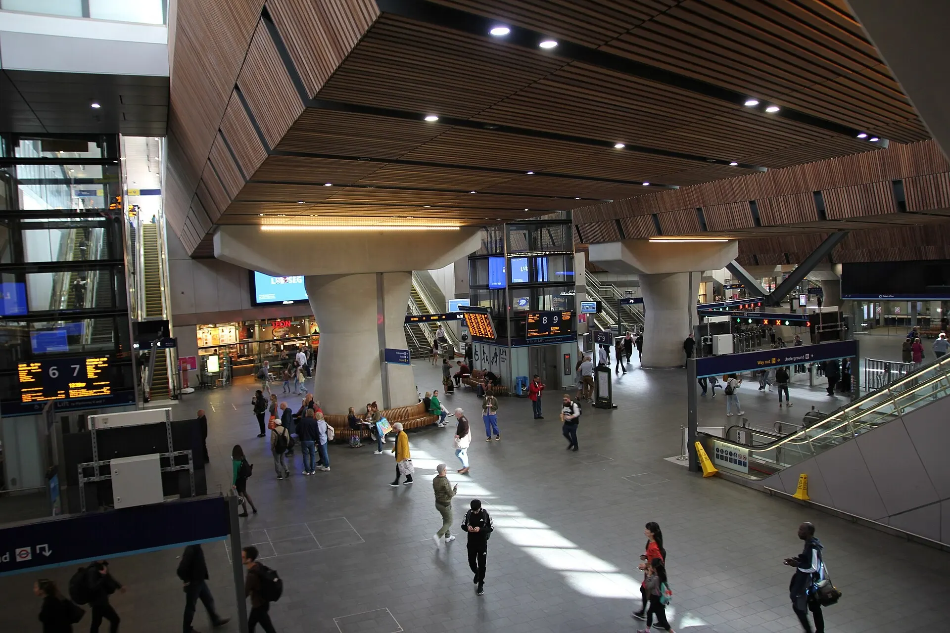 An upper-level view across London Bridge station concourse