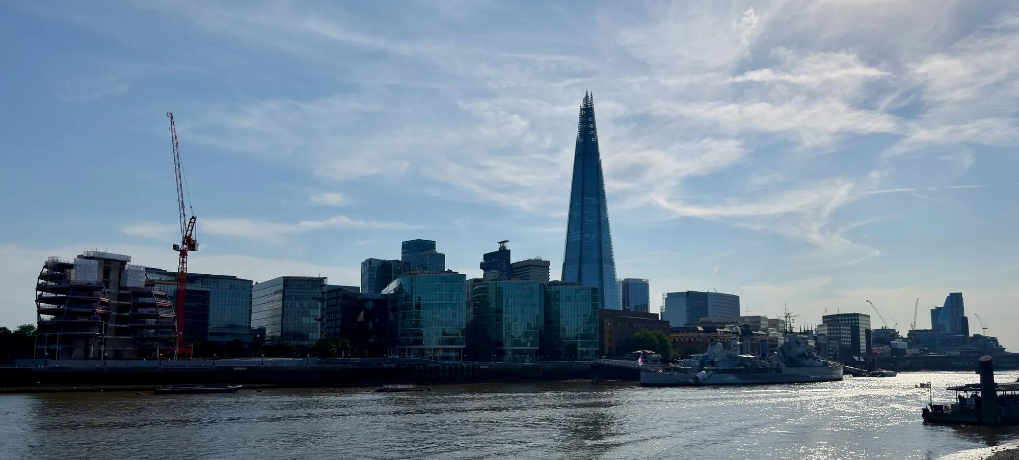The Shard and HMS Belfast across the River Thames in London
