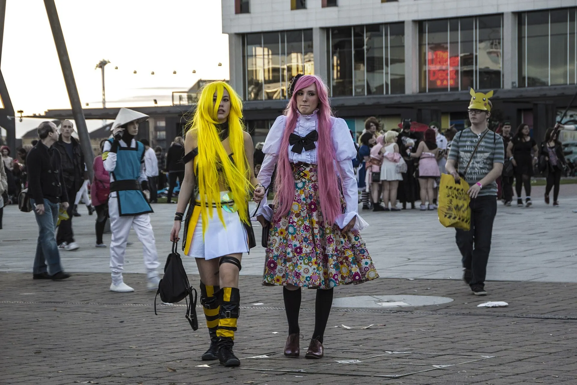 Costumed visitors outside MCM London Comic Con in 2014