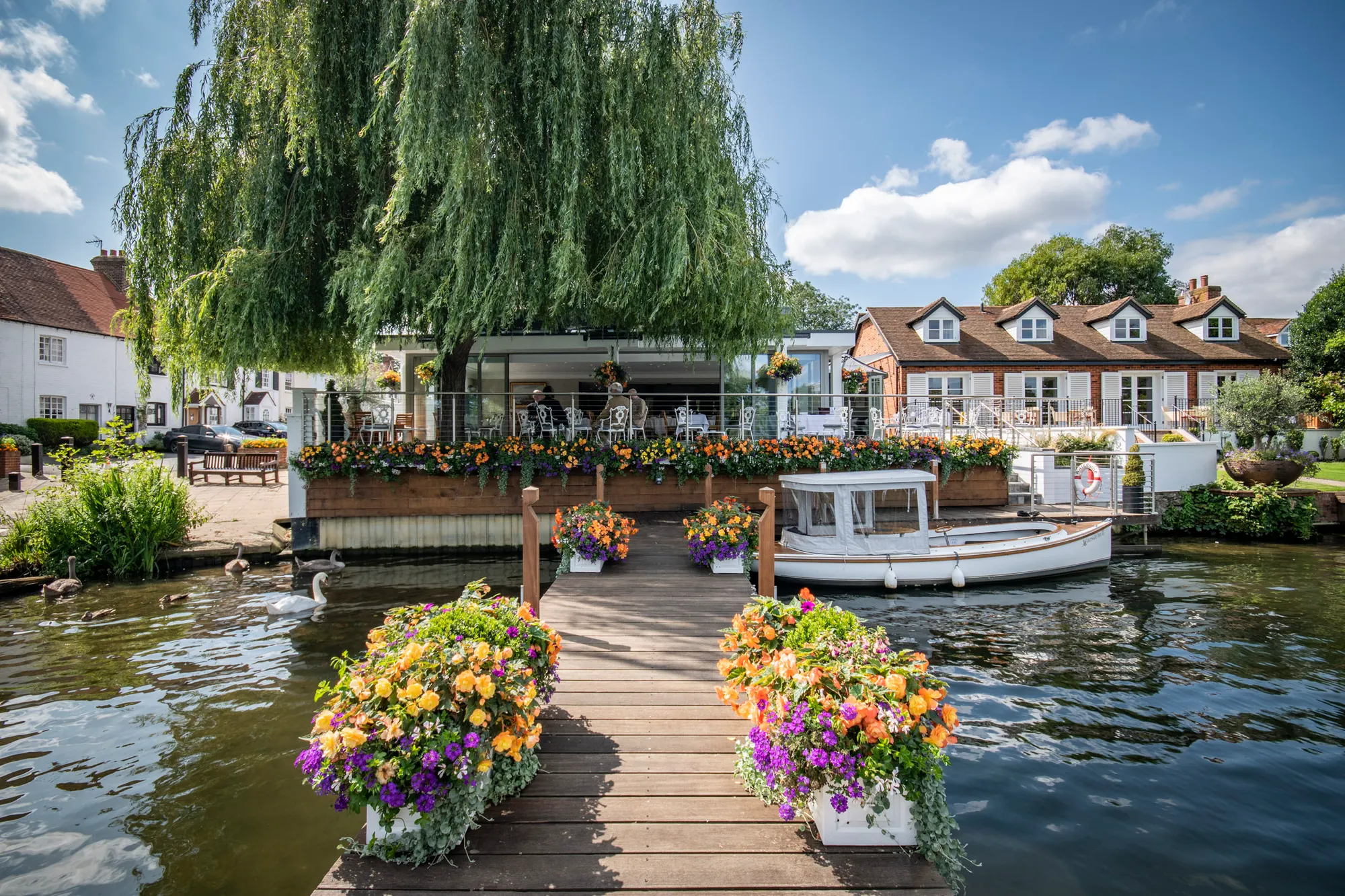 The Waterside Inn dining terrace and jetty beside the River Thames