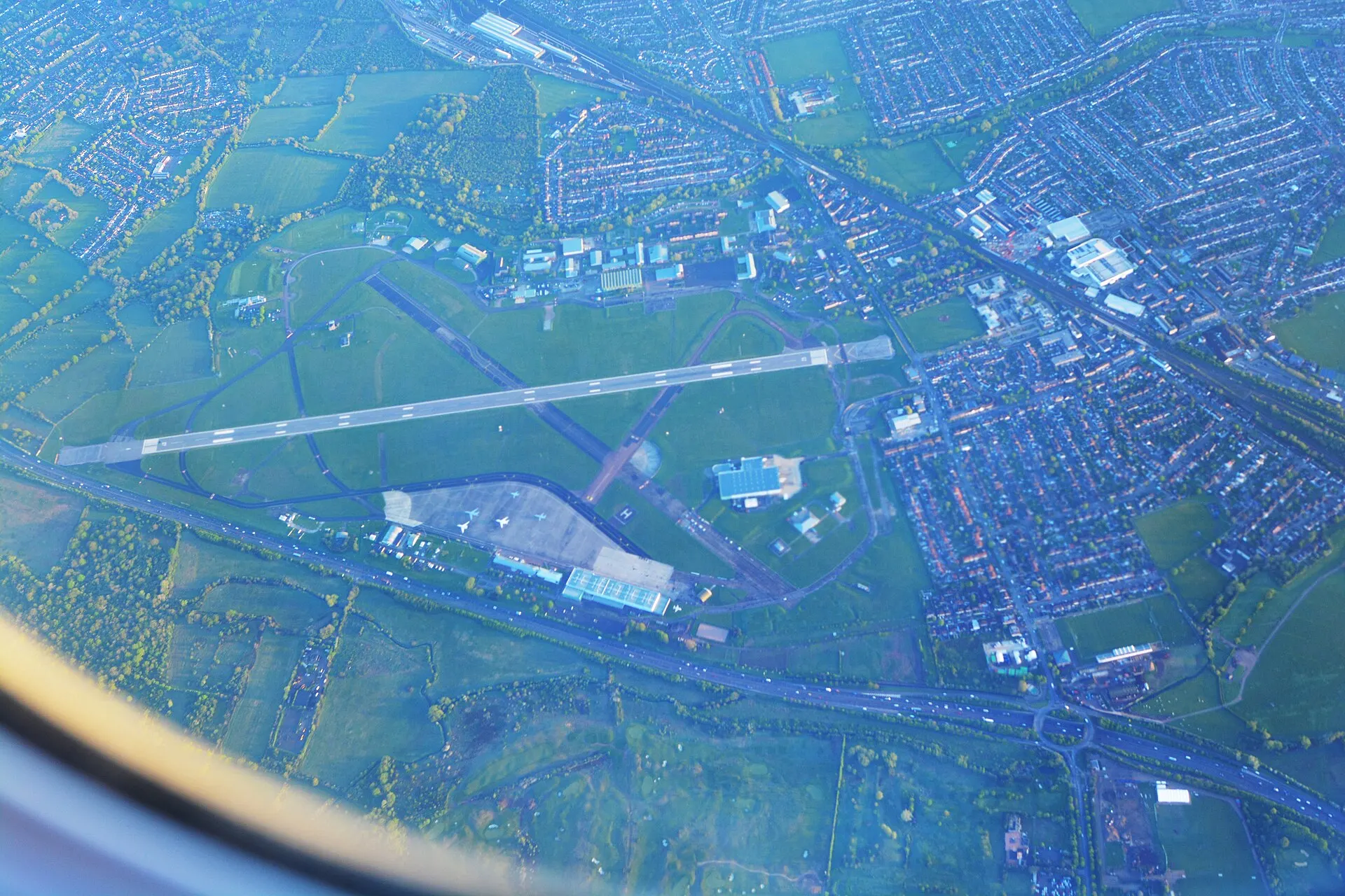 Aerial photograph of RAF Northolt's runway and surrounding airfield in 2024