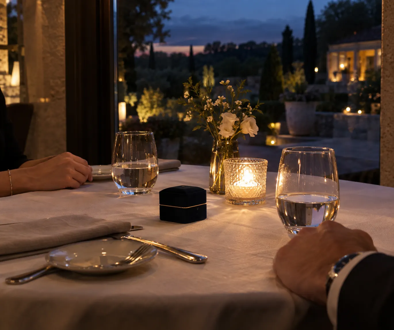 Illustrative private dinner setting with a ring box ready for a proposal