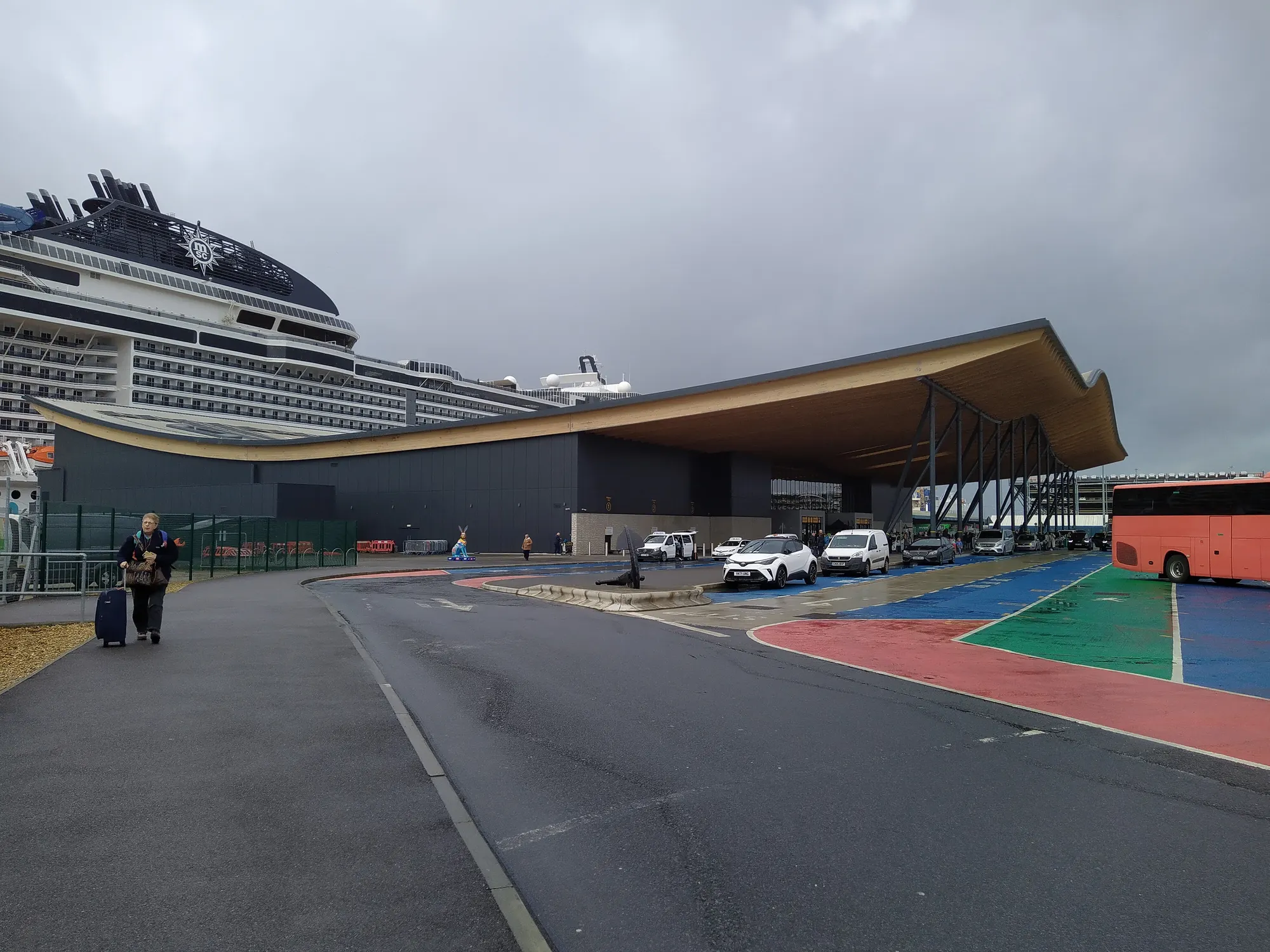 Horizon Cruise Terminal and a ship alongside at Southampton in March 2024