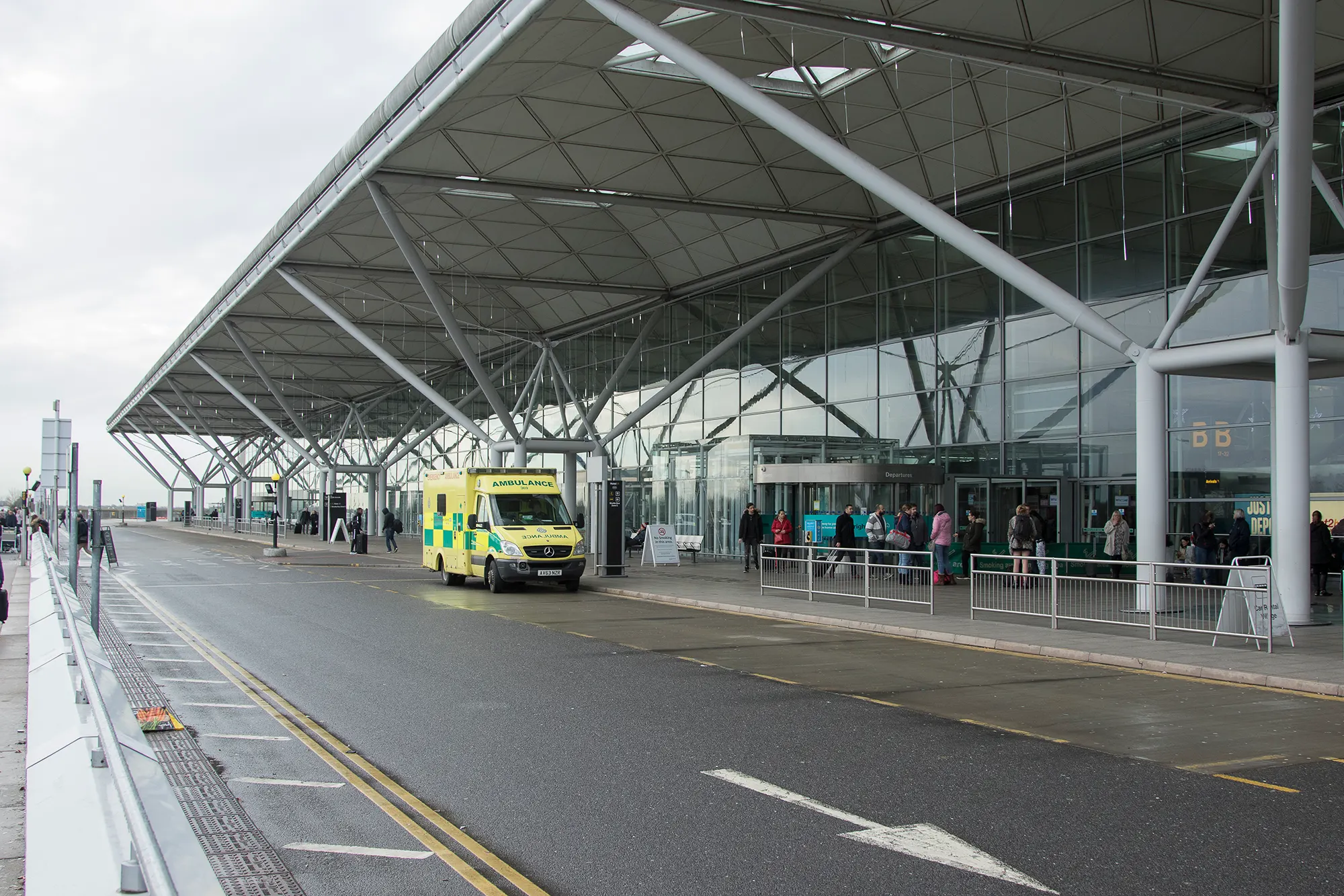 London Stansted Airport departures frontage photographed in January 2018; historic layout, not current lane guidance
