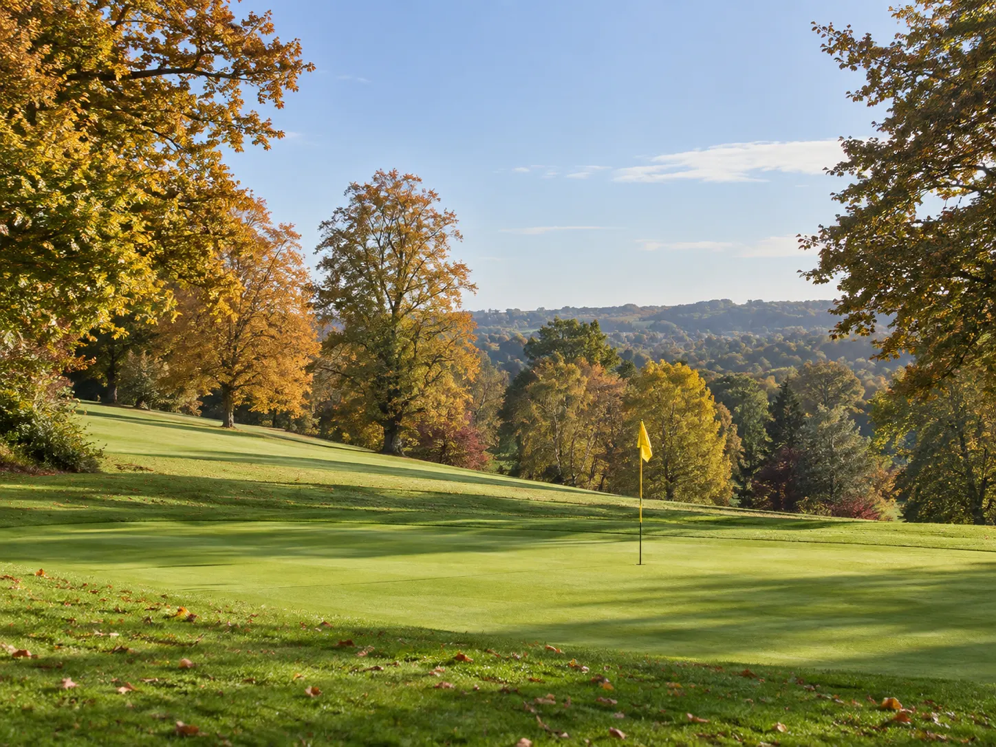 Illustrative autumn green at Temple Golf Club, grounded in licensed photographs
