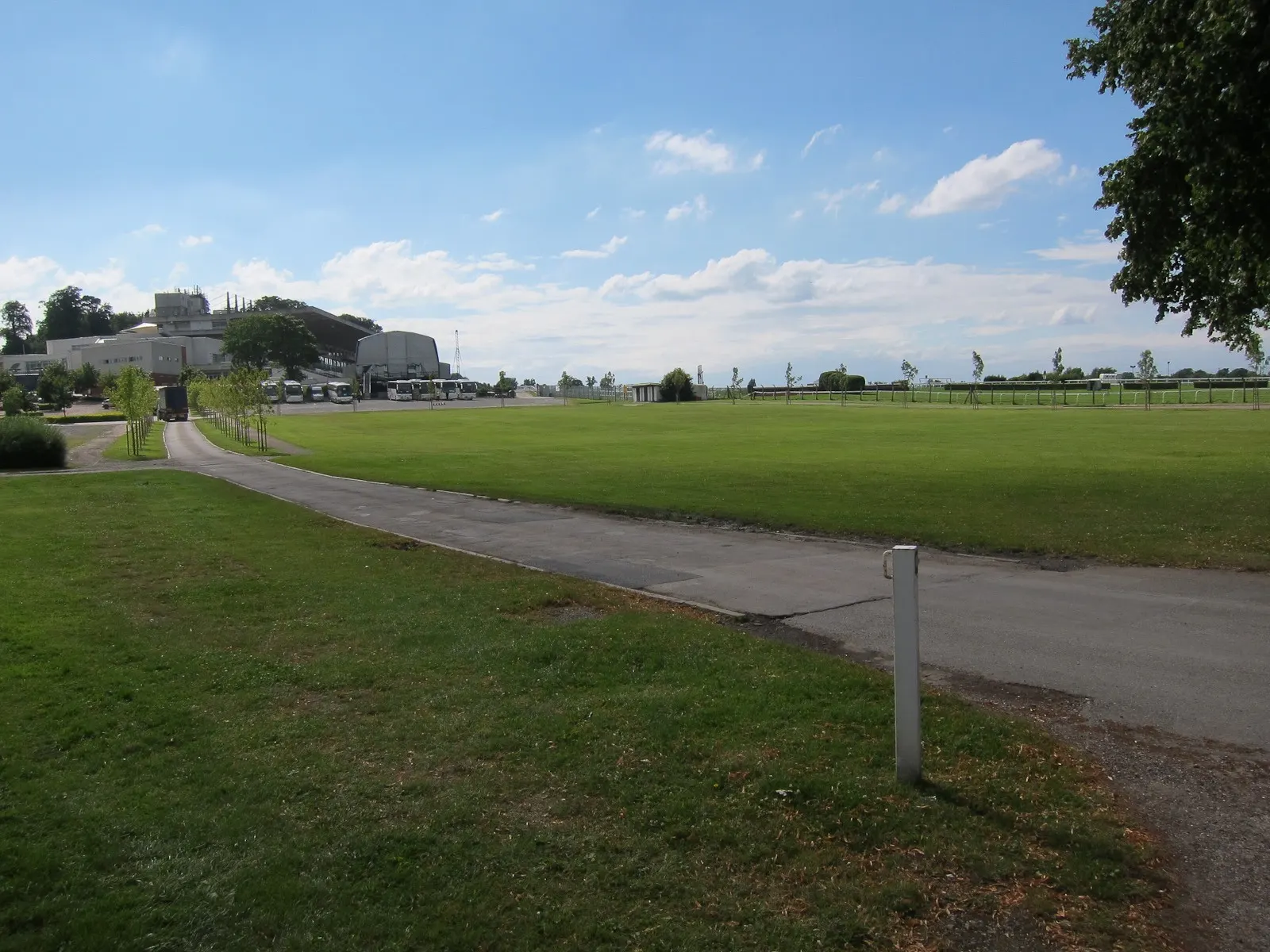 Open grounds and racecourse rails at Sandown Park