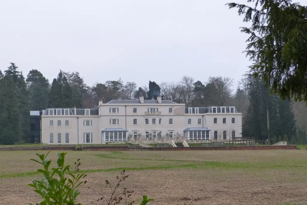 Coworth Park mansion across its meadow in 2014